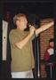 Primary view of [Blonde man speaking into a corded microphone on a stage: Lone Star Ride 2001 event photo]