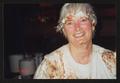 Photograph: [Close up portrait of Janie Bush with pie covering the edges of her f…
