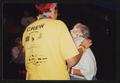 Photograph: [Janie Bush getting pied by a man in a yellow crew t-shirt: Lone Star…