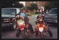Photograph: [Two motorcyclists on their bikes turned to the camera: Lone Star Rid…