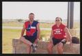 Photograph: [Two cyclists sitting together taking a break: Lone Star Ride 2001 ev…
