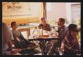 Photograph: [Three people sitting at a corner patio table, 2: Lone Star Ride 2001…