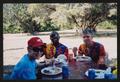 Photograph: [Cyclists and crew members eating in the shade: Lone Star Ride 2005 e…