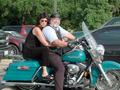 Photograph: [Man and woman on a motorcycle at Saxon Pub]