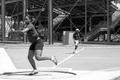 Photograph: [Alana Tyler competes in shot put event, 1]