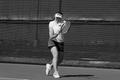 Photograph: [UNT women's tennis player hits backhand during ULM match, 1]