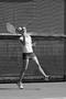 Photograph: [Lynley Wasson hits forehand during Stephen F. Austin match, 8]