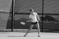 Photograph: [Lynley Wasson hits forehand during Stephen F. Austin match, 5]