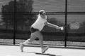 Photograph: [UNT women's tennis player hits backhand during Stephen F. Austin mat…