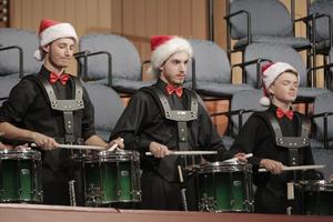Primary view of object titled '[Three drummers at the Percussion Holiday Performance]'.