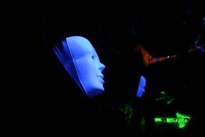 Primary view of object titled '[Glowing mask display in haunted house]'.