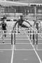 Primary view of [Ronniqua Wilson jumps hurdles with opposition, 1]