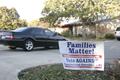 Photograph: ["Families Matter!" sign on Denton lawn]