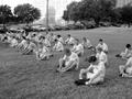 Photograph: [AFROTC stretches in field]