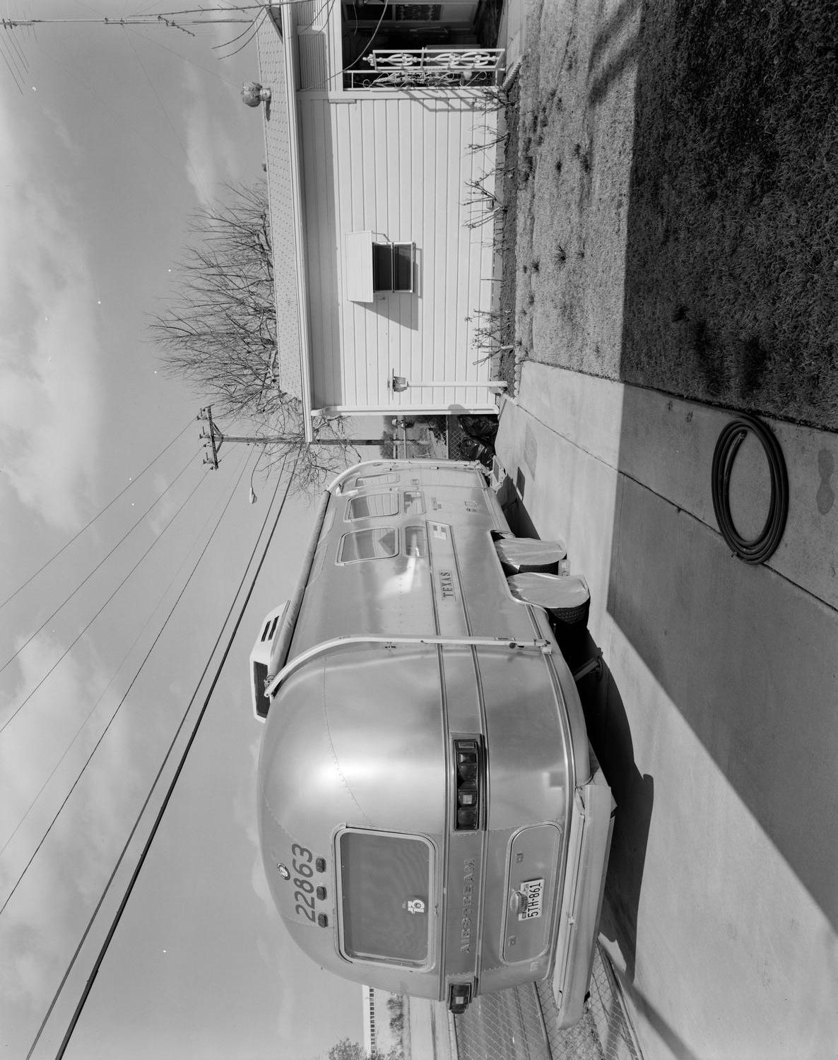 [An airstream next to a house]
                                                
                                                    [Sequence #]: 1 of 1
                                                