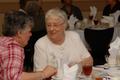 Photograph: [Elsie Wiley and June Wade converse at 2006 SVCI Luncheon]