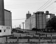 Thumbnail image of item number 1 in: '[Grain silos on S. Main St. in Fort Worth]'.