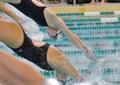 Thumbnail image of item number 1 in: '[UNT and NMSU competitors dive into lap pool]'.