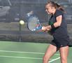 Photograph: [Barbora Vykydalova hits backhand during TCU match]