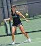 Photograph: [Nadia Lee hits forehand during FIU match, 1]