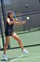 Photograph: [Nadia Lee hits forehand during FIU match, 2]