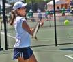 Photograph: [Lisa Johnson hits forehand during UNT match]