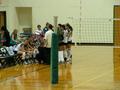 Photograph: [UNT volleyball team huddles on the sidelines during Tulsa match]