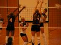 Photograph: [Ana Buccini and Sarah Breedlove attempt to block spike by UNT player]