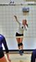 Photograph: [McKenna Thornlow serves volleyball]