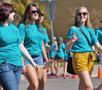 Primary view of [Delta Gamma members walk 2012 Homecoming Parade]