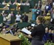 Primary view of [Woman sings at UNT Fall 2011 Commencement]