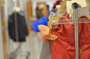 Primary view of object titled '[Outfits on the rack at Fashion at the Fountains 2011]'.