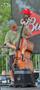 Photograph: [Man plays double bass at Denton Arts and Jazz Festival 2012]