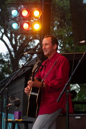 Primary view of object titled '[Tom Kimmel performs at Kerrville Folk Festival]'.