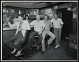 Photograph: [Four men at a bar]