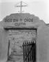 Photograph: [An archway entrance in New Mexico]