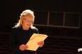 Photograph: [Myra Crownover reads proclamation to A Cappella Choir, 5]