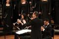 Photograph: [Allen Hightower conducts the A Cappella Choir at "A Sacred Celebrati…