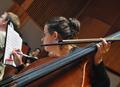 Photograph: [Kristin Keys marks up sheet music during Boston Early Music Festival…