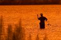 Photograph: [Solitude in Sunset: Angler's Delight on Lake Amistad]