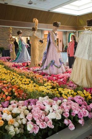 Primary view of object titled '[Graceful Elegance: Victorian Gowns Amidst a Sea of Roses at Tyler Rose Museum]'.