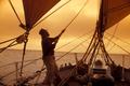 Photograph: [Seafaring Mastery: A Captivating Evening Sail on Galveston Waters]