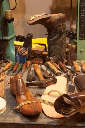 Primary view of object titled '[Cowboy boots being made]'.
