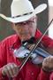 Photograph: [Soulful Melodies: The Cowboy Violinist]