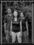 Photograph: [Three People in a Forest Scene]