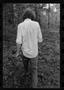 Photograph: [Cropped Man Walking in the Woods]
