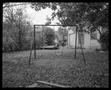 Photograph: [Swing Set Triangle in Foreground, 1987]