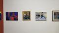 Photograph: [Paintings on display at the QHS conference exhibit]