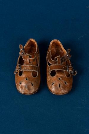 Primary view of object titled 'Brown leather baby shoes'.