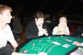 Photograph: [Three UNT Students at Poker Table]